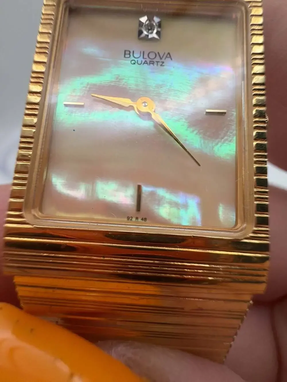 Bulova T1 Rectangular Mother-of-Pearl Quartz Watch with Gold-Tone Textured Strap
